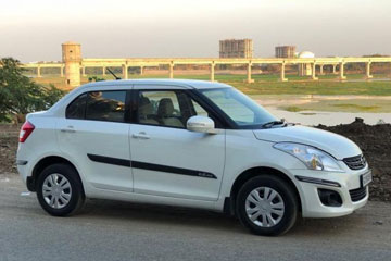 Dzire Taxi Hire in Una